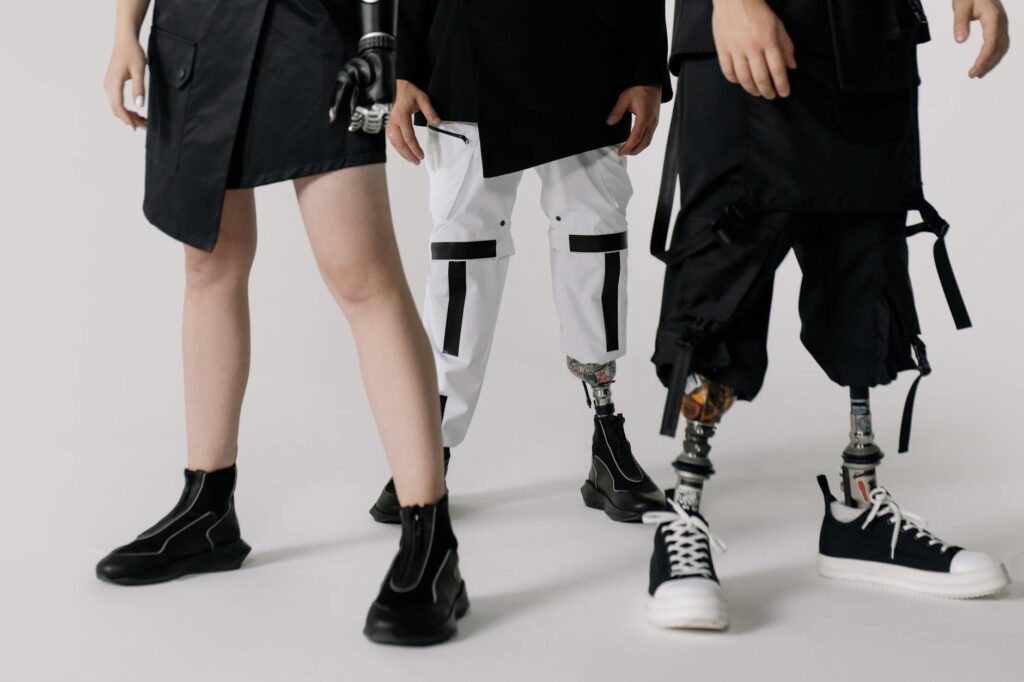 woman in black blazer and white dress pants